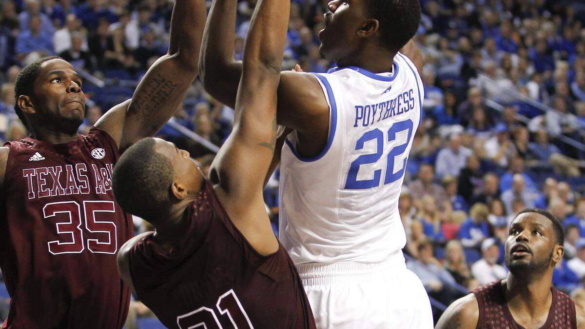 Kentucky Wildcats forward Alex Poythress (22) put up a shot over Texas A&M Aggies guard Elston Turner (31) as Texas A&M defeated Kentucky 83-71 on Saturday January 12, 2013 in Lexington, KY. Photo by Mark Cornelison | Staff 