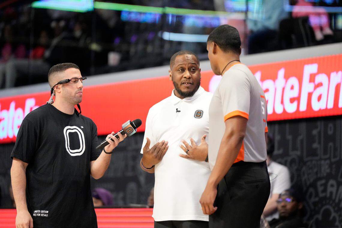 RWE head coach Corey Frazier, center, played college basketball at Saint Louis and once faced Kentucky in the NCAA Tournament.