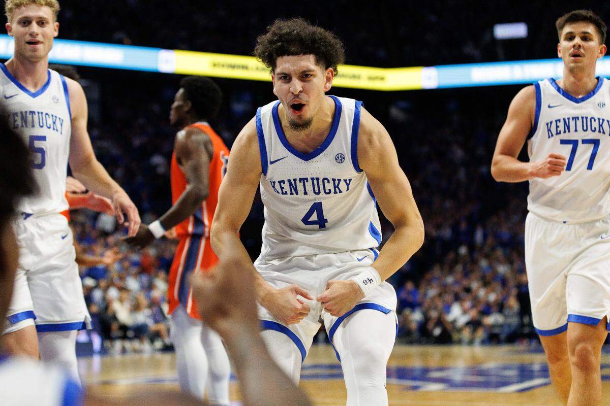 Nov 9, 2024; Lexington, Kentucky, USA; Kentucky Wildcats guard Koby Brea (4) celebrates as he runs to help center Amari Williams up from the floor during the second half against the Bucknell Bison at Rupp Arena at Central Bank Center. Mandatory Credit: Jordan Prather-Imagn Images