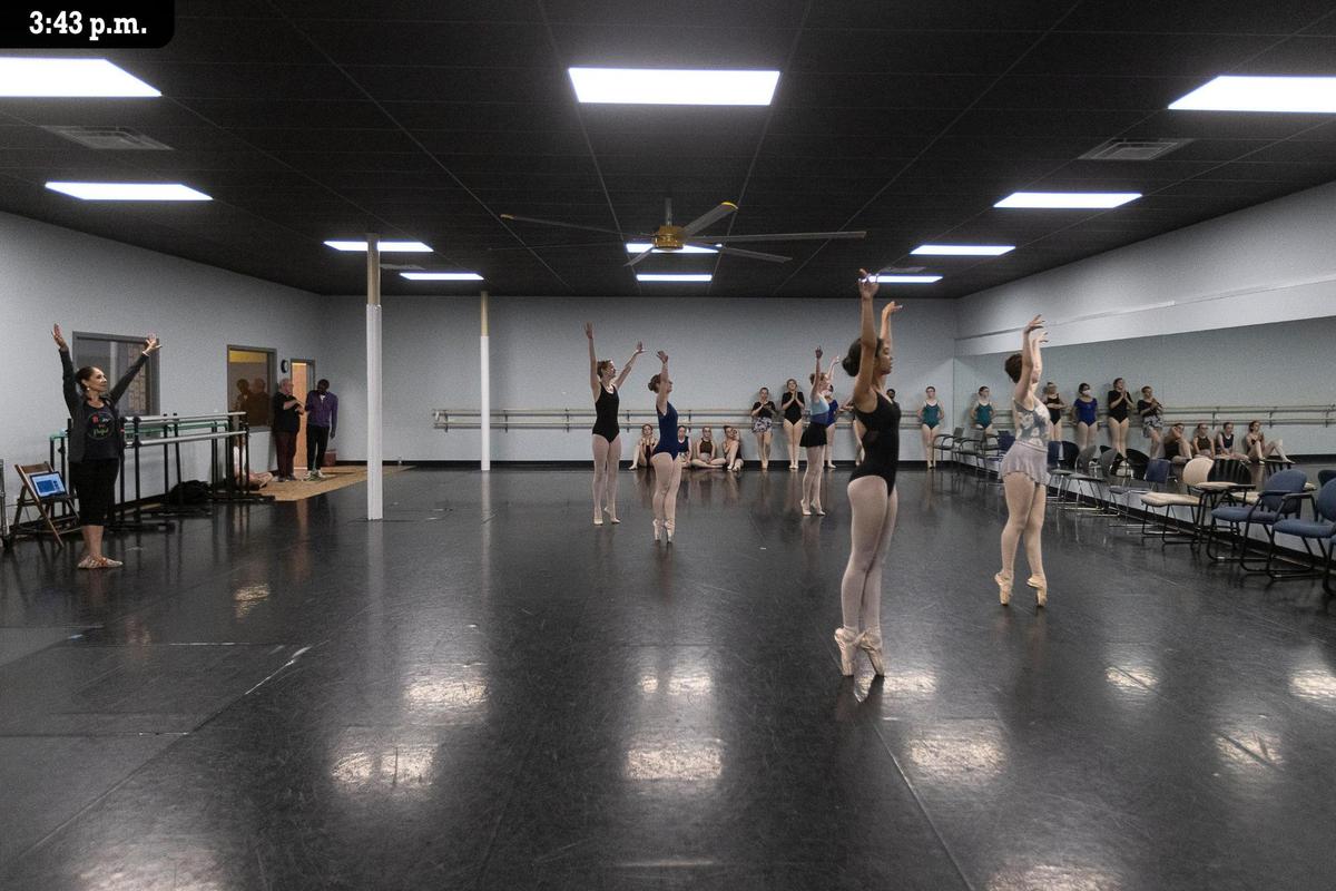 Bluegrass Youth Ballet students hold a pose as they finish rehearsing a section of their performance in their studio on Southland Drive Friday, July 9. The students, ages 12 to 17, were finishing their first week of the summer intensive program before performing for family later in the afternoon. Director Adalhi Aranda, left, who founded the ballet program in 2003, played music through a speaker while signaling to her students through the mirror. After each set, Adalhi would switch out groups to give each of them time to rest.