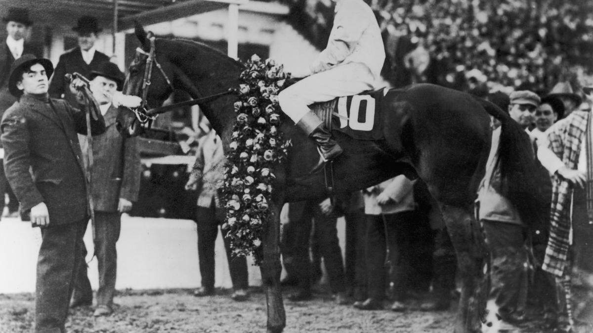 Old Rosebud, a bay gelding, won the 40th running of the Kentucky Derby in 1914 with jockey John McCabe in the saddle. Roses had already become a winner's circle tradition.  