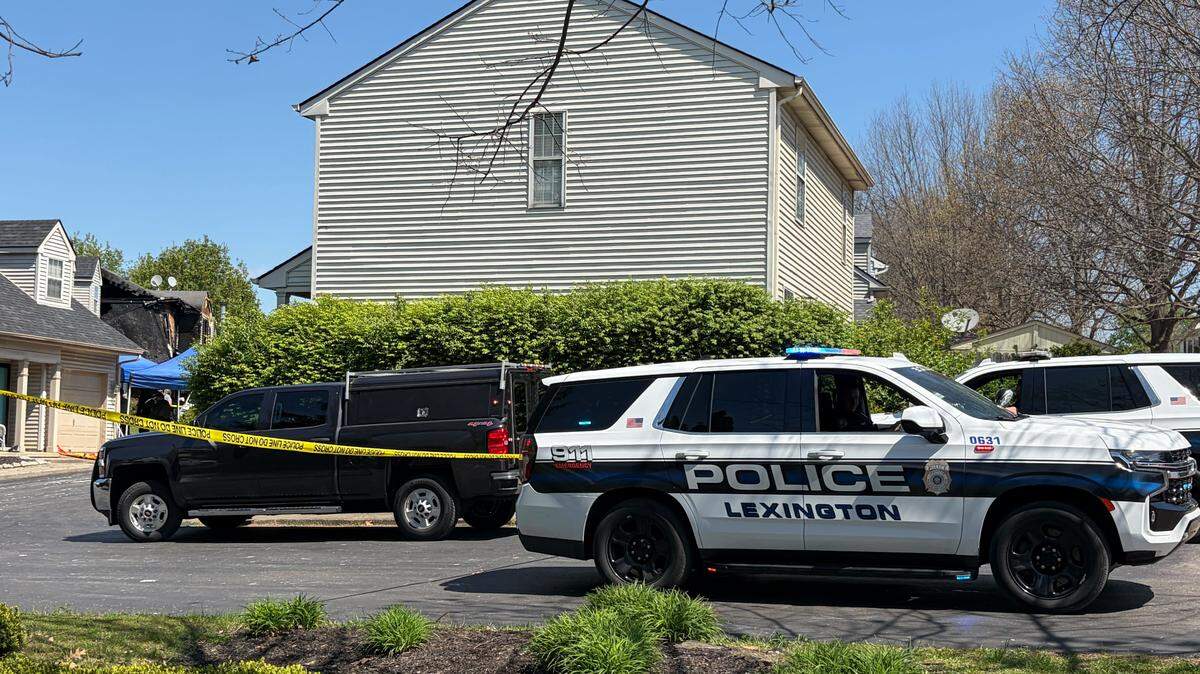 Investigators are on the scene of a house fire in Lexington on Sunday, April 12, 2026.