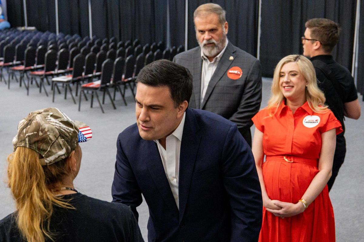Nate Morris shakes hands with an attendee during his campaign launch event on Monday, June 30, 2025, at Paroquet Springs Conference Center in Shepherdsville, Ky.