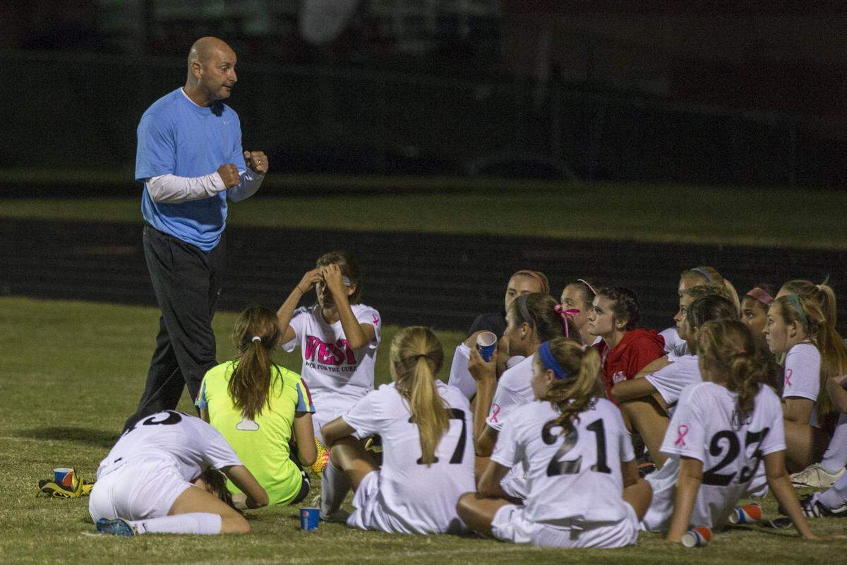 West Jessamine Coach Kevin Wright delivered some motivation for his team during halftime of a game in 2014. Wright, who led the Colts to two state titles in his 14 years, announced his retirement last month.