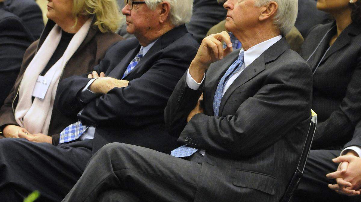 Gov. Steve Beshear, right, and U.S. Rep. Hal Rogers listened to a panel discussion at the summit, which drew a crowd of more than 1,700 people. 