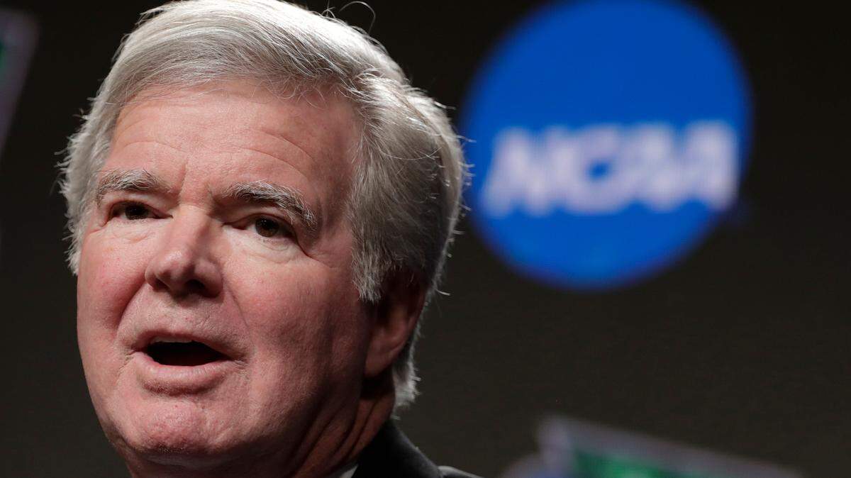 FILE - In this April 4, 2019, file photo, NCAA President Mark Emmert answers questions during a news conference at the Final Four college basketball tournament in Minneapolis. The NCAA Board of Directors is expected to greenlight one of the biggest changes in the history of college athletics when it clears the way for athletes to start earning money based on their fame and celebrity without fear of endangering their eligibility or putting their school in jeopardy of violating amateurism rules that have stood for decades.(AP Photo/Matt York, File)
