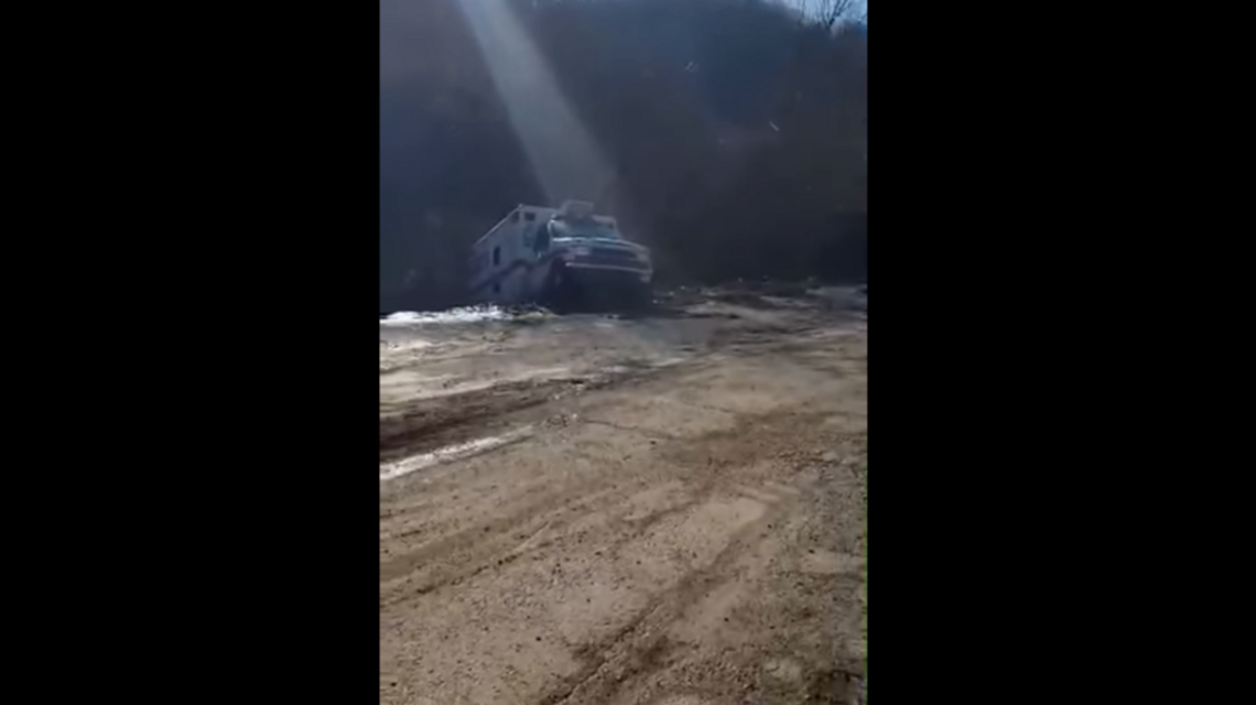 Embankment failure spills vehicles, ambulance into Eastern Kentucky river after flood