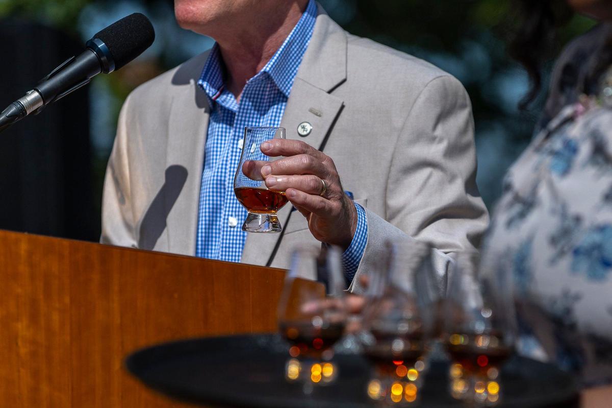 Chris Morris, Woodford Reserve master distiller emeritus, offers a toast during at a dedication of the historic Pepper House, built in 1812, at Woodford Reserve Distillery. The house has undergone extensive renovations and will become home to the distillery’s Personal Selection program.