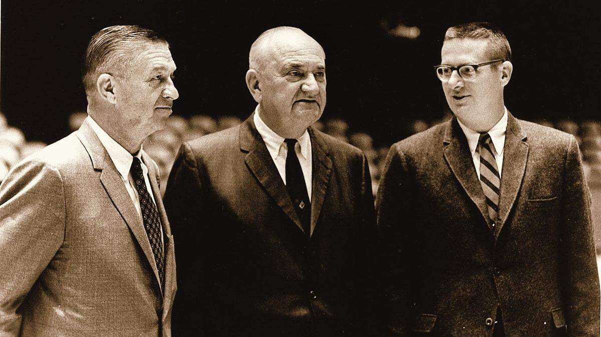 1969 FILE PHOTO. The University of Kentucky s men s basketball coaching staff, Harry Lancaster, Adolph Rupp and Joe Hall, shown after a UK basketball game in Memorial Coliseum during the 1968-69 season. This was the last season the three coached together. Lancaster became full time athletics director at UK and Hall became the head mens basketball coach at St. Louis University.