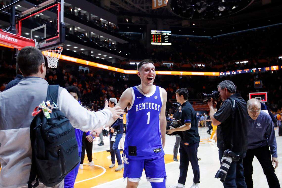 Kentucky guard CJ Fredrick (1) celebrates while walking off the court after his team’s 63-56 defeat of Tennessee at Thompson-Boling Arena in Knoxville on Saturday.