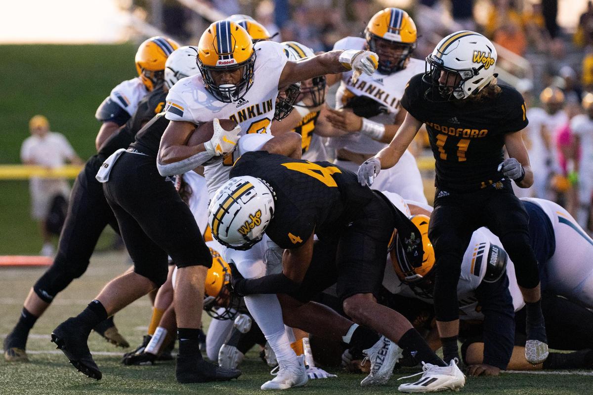 Franklin County’s Kaden Moorman (10) fell into the end zone for one of his three touchdowns against Woodford County.