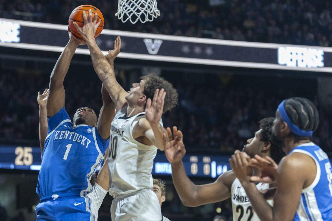 Vanderbilt guard Chris Manon (30) blocks a shot by Kentucky guard Lamont Butler (1) during Saturday’s game at Memorial Gymnasium in Nashville, Tennessee.