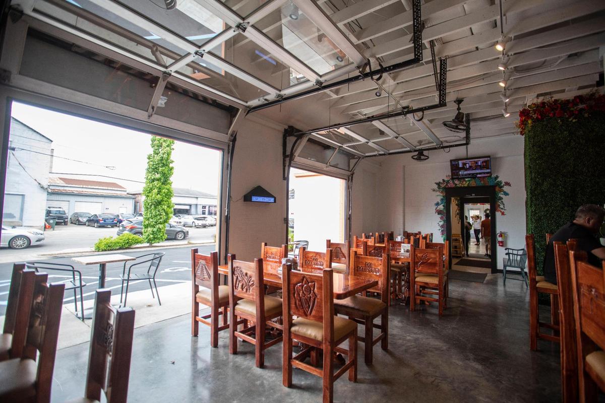 Mexico Mi Amor has a bar area with garage doors that overlooks the intersection of Louden Avenue and North Limestone.