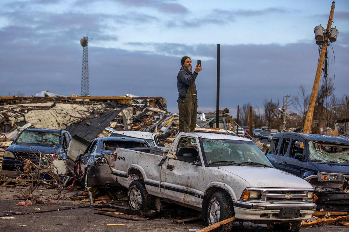 Brad Marshall, of Mayfield, surveys the damage on Saturday, Dec. 11, 2021. A deadly tornado ripped through the region Friday.