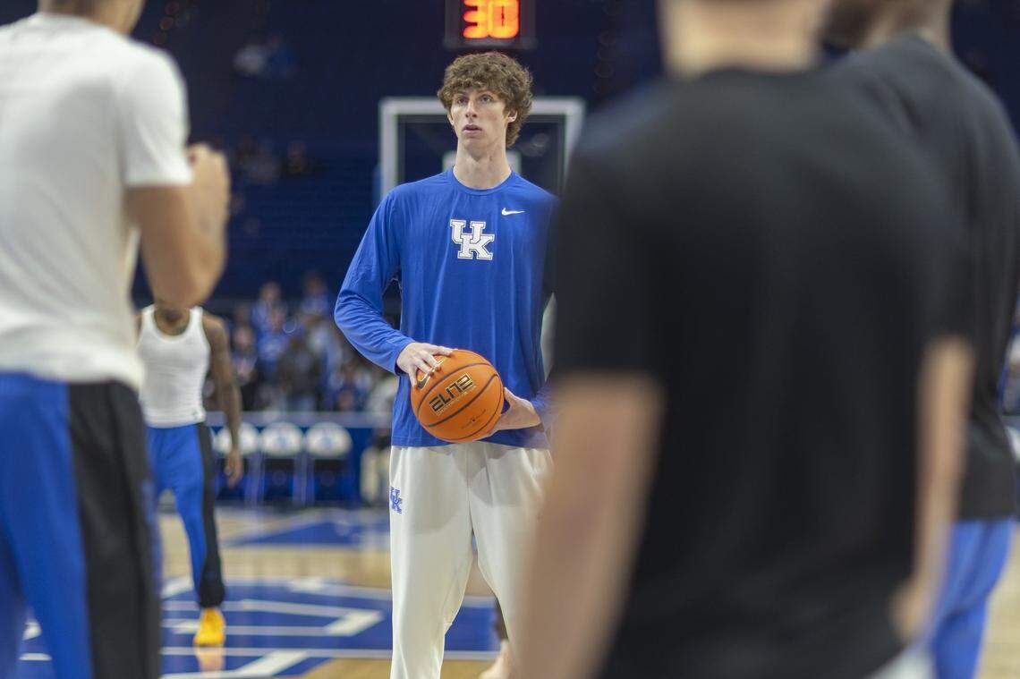 Kentucky forward Reece Potter looks to pass the ball to a teammate during warmups before UK’s exhibition game against Purdue at Rupp Arena in Lexington, Ky., on Friday, Oct. 24, 2025.