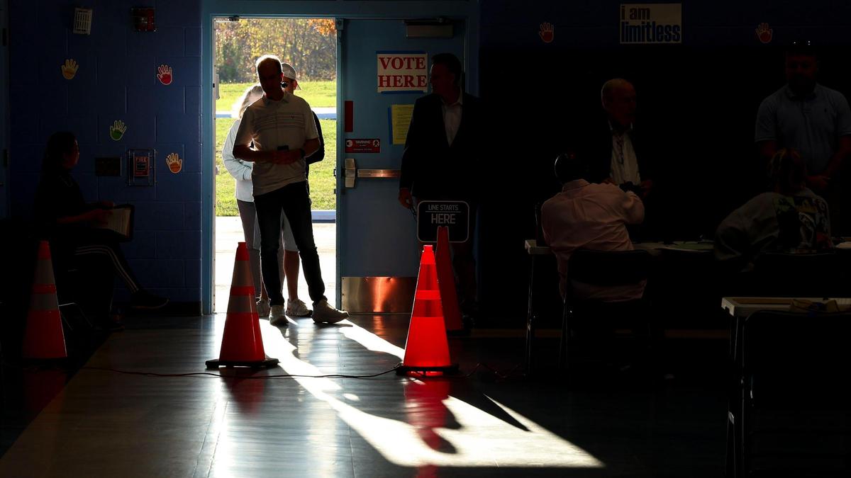 Voters line up to vote in 2024 general election at Liberty Elementary School, Tuesday, Nov. 5, 2024, in Lexington, Ky.