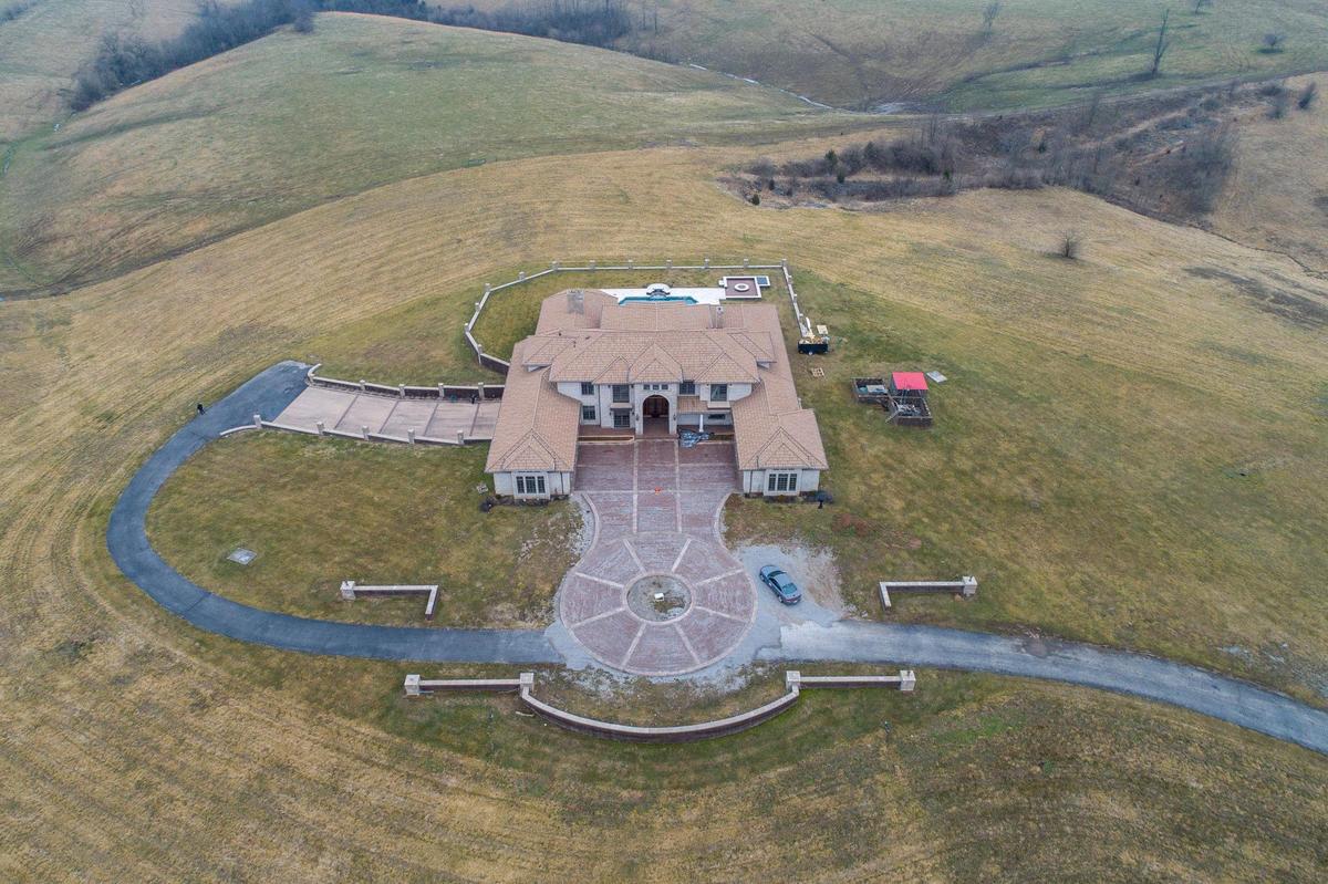 Members of the Kentucky State Police continued their investigation at C. Wesley Morgan’s home in Richmond, Ky., on Wednesday, Feb. 23, 2022. On Tuesday, Morgan’s daughter, Jordan Morgan, was killed in a deadly home invasion.