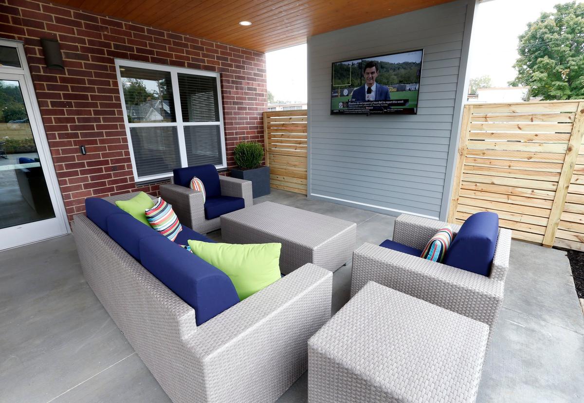 The outdoor entertainment area with lounge, gas grill, and fire pit at The Flats At 345, at 345 Blackburn Avenue in Lexington. Developer Norwood “Buddy” Cowgill is opening 72 downtown units at this location which is at the corner of Fourth Street and Blackburn Avenue near Newtown Pike. Also included in the area is Bocce Ball and Corn Hole.