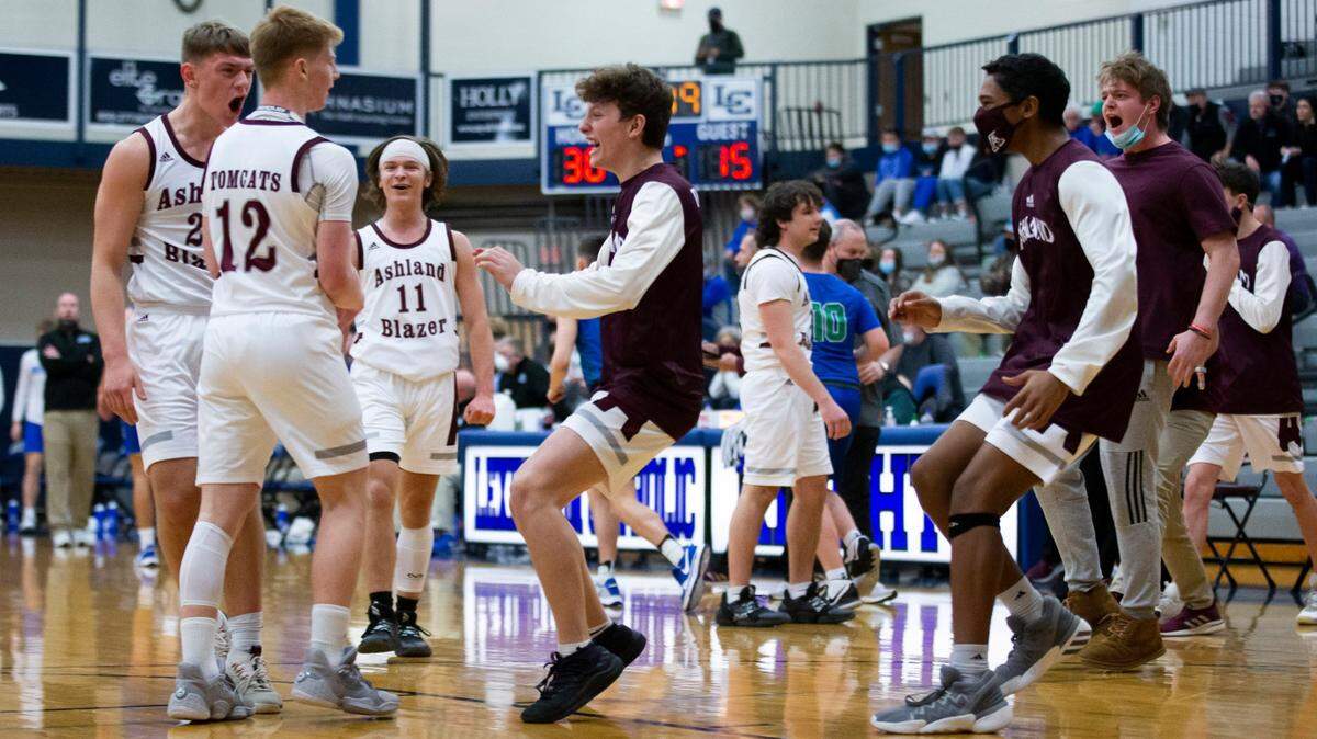Ashland Blazer players celebrate during the game against North Laurel at Lexington Catholic. Ashland Blazer won the 16th Region. North Laurel was knocked out in the 13th Region finals.
