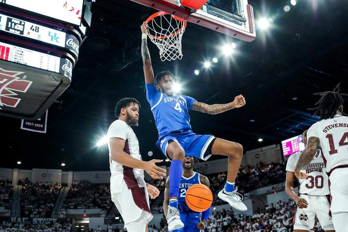 Kentucky forward Daimion Collins (4) dunks the ball against Mississippi State and draws a foul during Wednesday’s game at Humphrey Coliseum in Starkville, Miss.