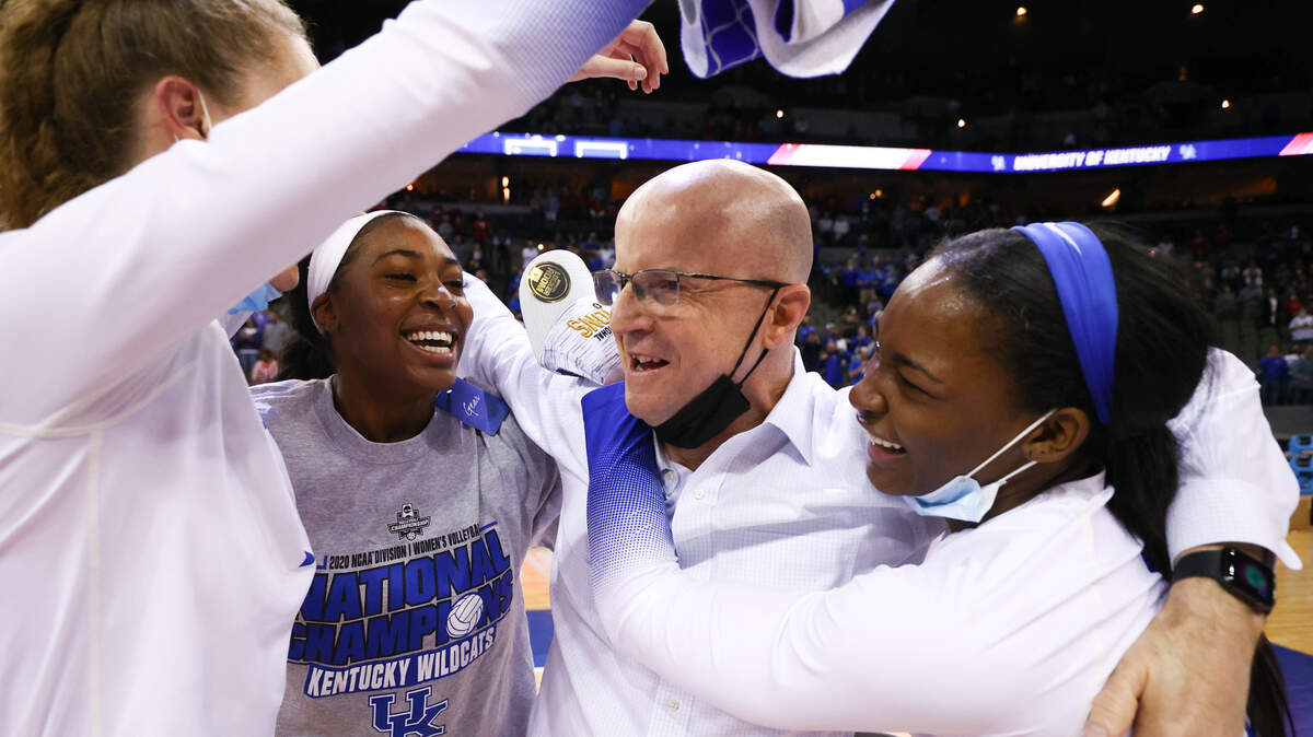 Kentucky Coach Craig Skinner celebrates with his players after the Wildcats defeated Texas to win the national championship last April.