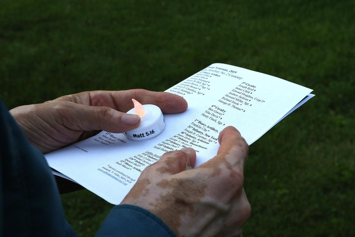 The names of Civil War veterans were read and a candle was lighted for each Saturday evening during the Juneteenth Jubilee at African Cemetery No. 2 on Seventh Street in Lexington.