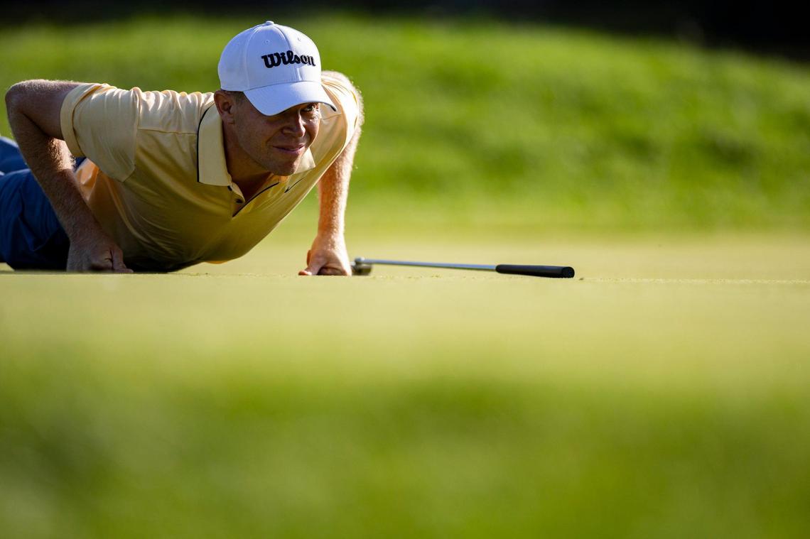 Alexander Knappe gets down to look at his ball during the first round of the ISCO Championship on Thursday, July 10, 2025, at Hurstbourne Country Club in Louisville, Ky.