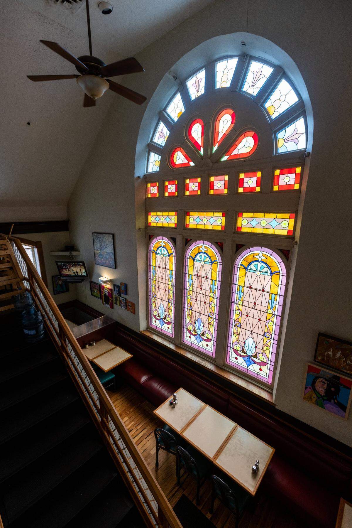 Stain glass windows of Joe Bologna’s Restaurant on Maxwell Street, August 17, 2021, which was built in 1891 as the Maxwell Street Presbyterian Church before being rededicated as a Jewish Synagogue, then as a restaurant in 1989.