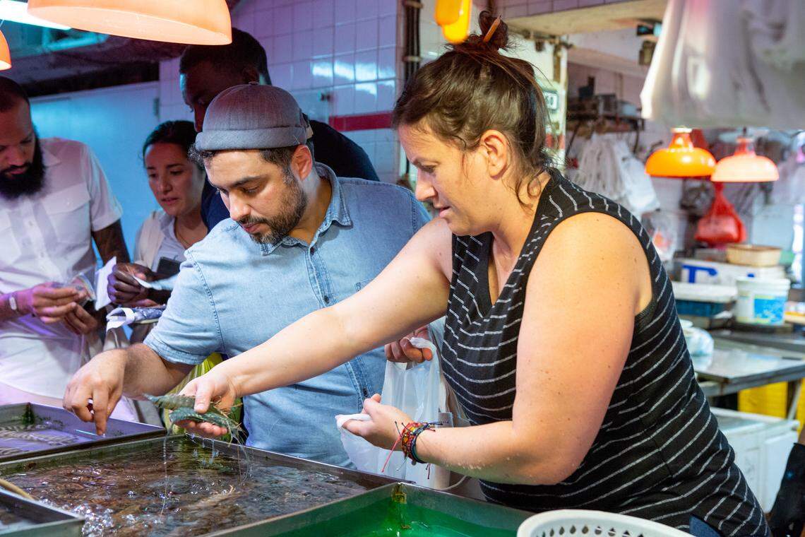 Kentucky’s Sara Bradley shops for who knows what with her eliminated teammates, including David Viana and Eddie Konrad, as she preps for the final competition.