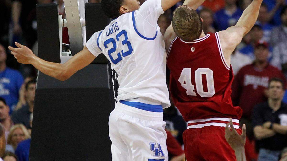 Anthony Davis blocked a shot by Cody Zeller as Kentucky defeated Indiana in the NCAA tournament on April 2.   Photo by Mark Cornelison | Staff 