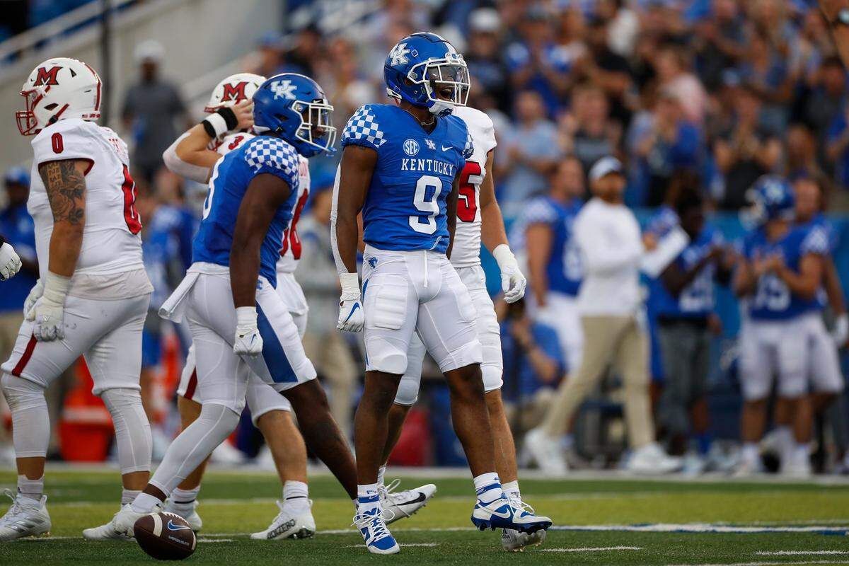 Kentucky wide receiver Tayvion Robinson (9) celebrates catching a pass for a first down against Miami (Ohio) at Kroger Field on Saturday.