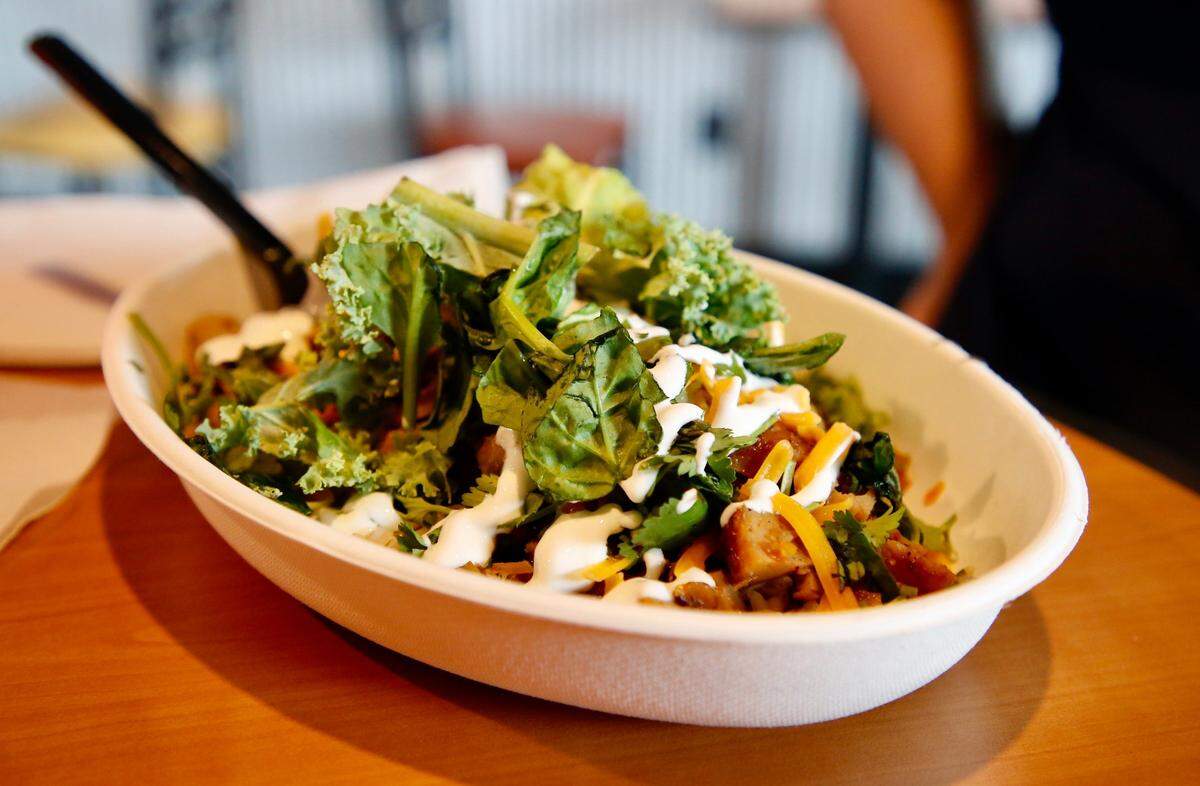 A Hawaiian bowl with added sour cream and super greens at Hot Head Burritos new Lexington location off Newtown Pike.