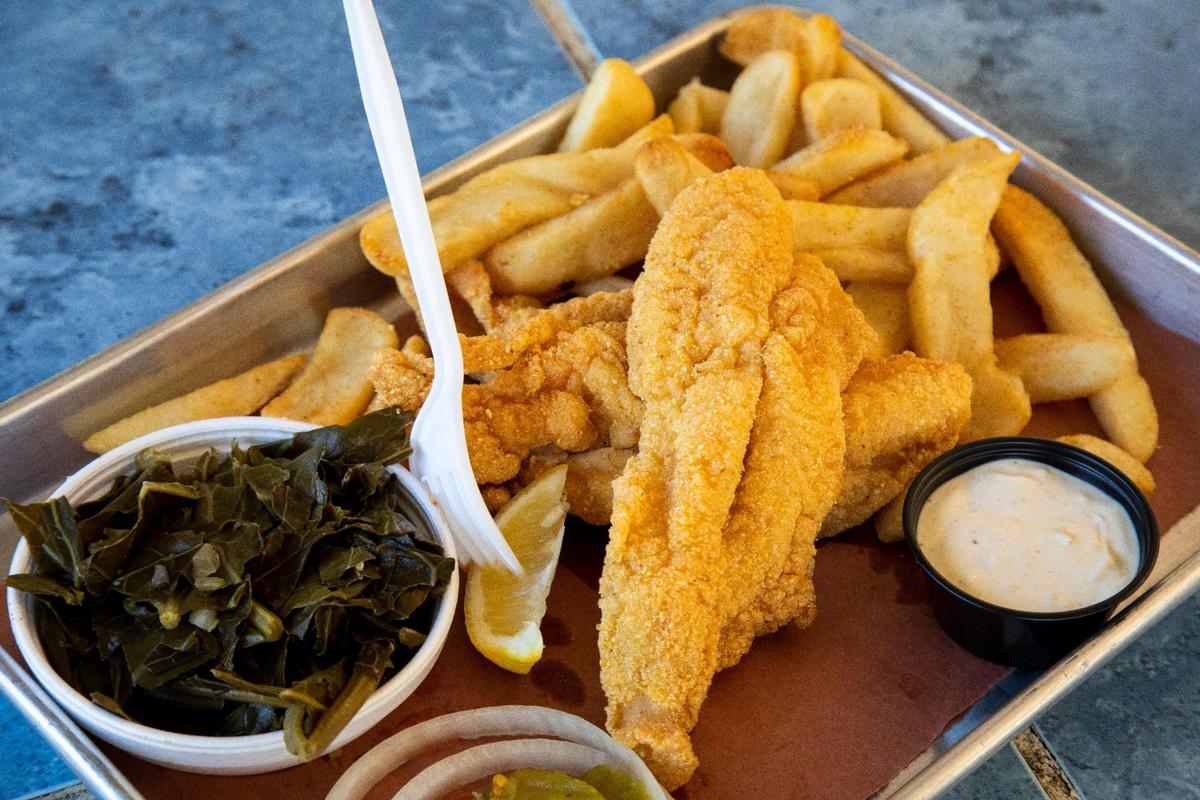 Fried catfish and fries from Proud Mary BBQ.
