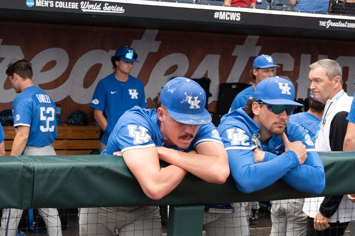 Kentucky pitcher Cameron O’Brien, left, and first baseman Ryan Nicholson look across the field after Wednesday’s season-ending defeat at the College World Series.