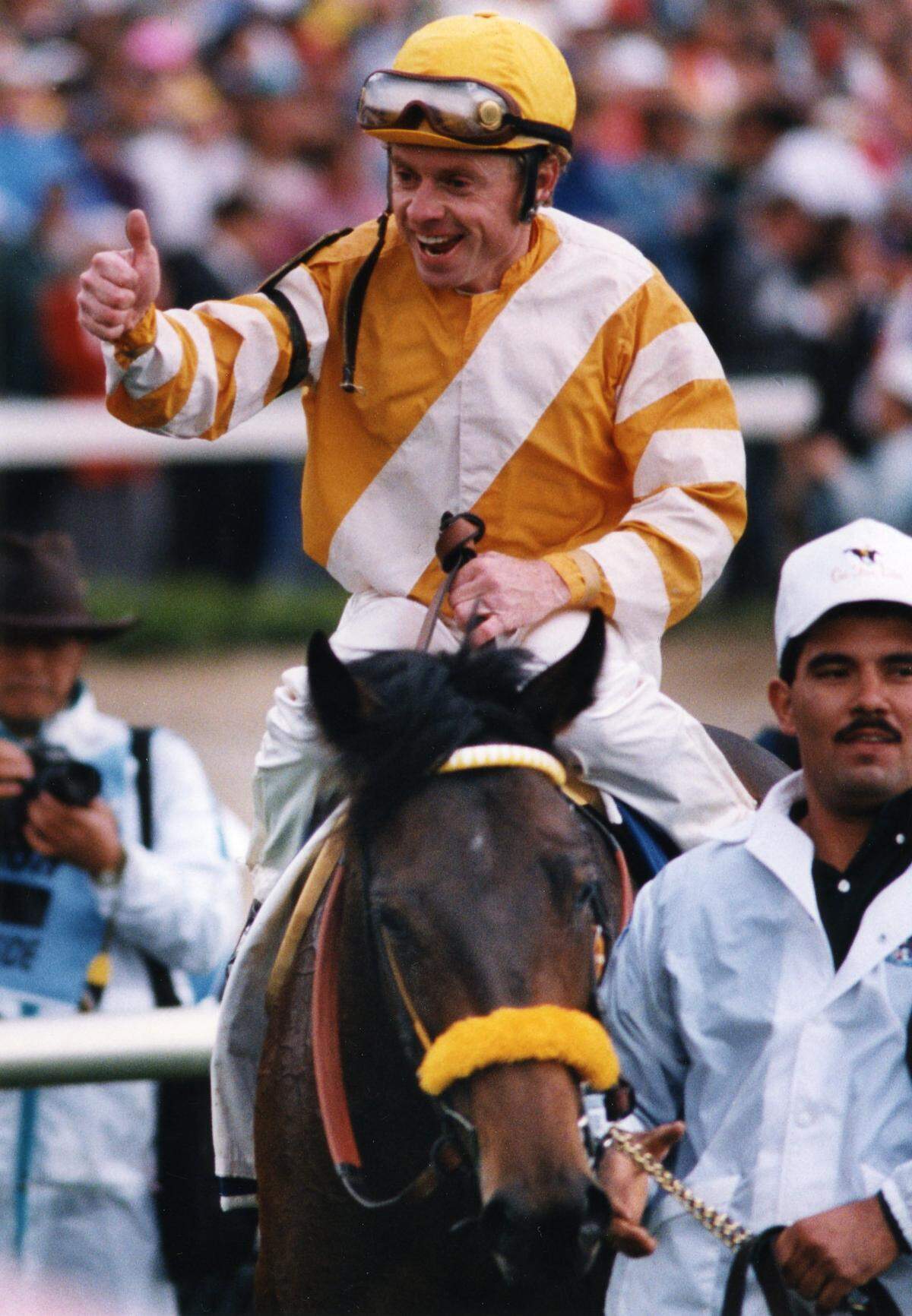 Jockey Chris McCarron celebrated aboard Go for Gin after winning the 1994 Kentucky Derby. Strodes Creek finished second, followed by Blumin Affair. The favorite, Holy Bull, wound up 12th.