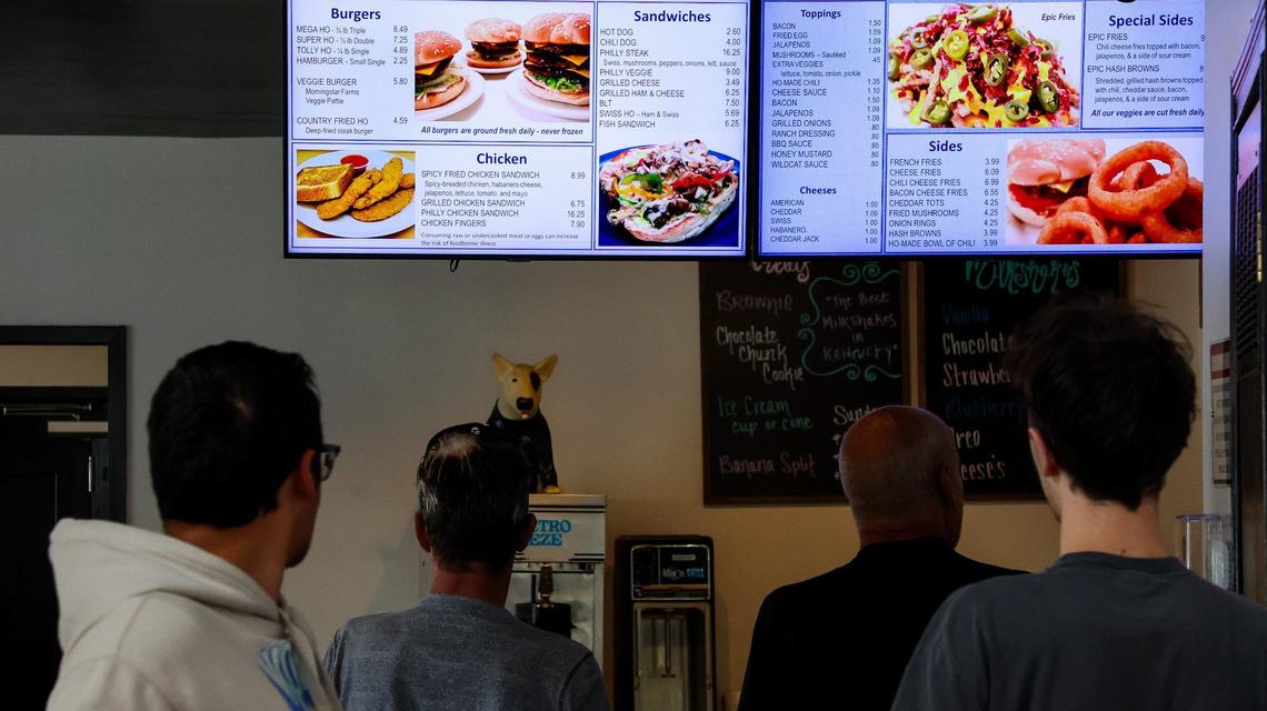 Customers look over the menu at the new Tolly-Ho location at 350 Foreman Ave. Sept. 3, 2024. in Lexington, Ky. The longtime Lexington restaurant is known for burgers and breakfast anytime.