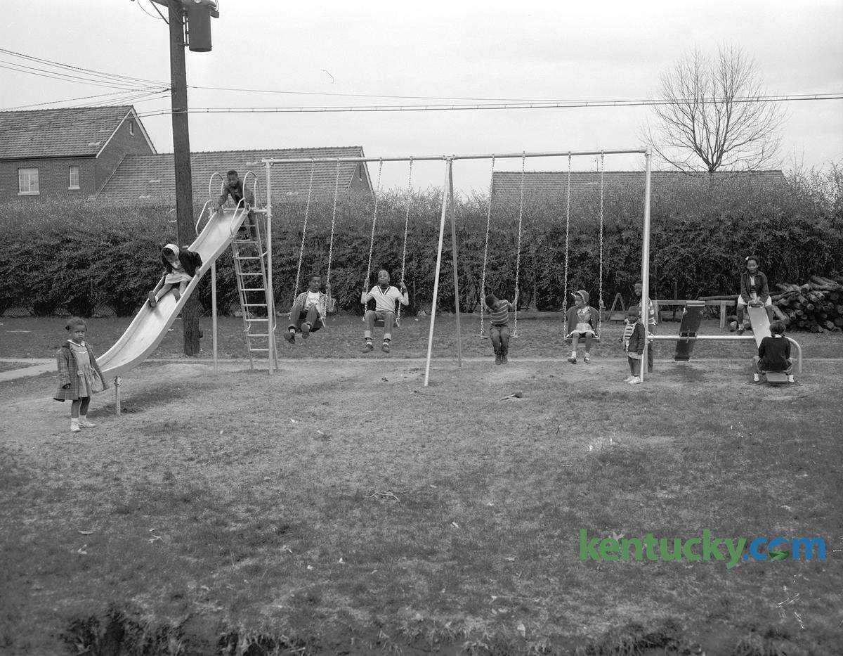 One of the playgrounds in the African American section of the Bluegrass-Aspendale housing project in Lexington’s east side in April 1954. An eight-foot fence separated blacks and whites from 1939 until January 1974. Published in the Lexington Herald-Leader April 18, 1954. Herald-Leader Archive Photo