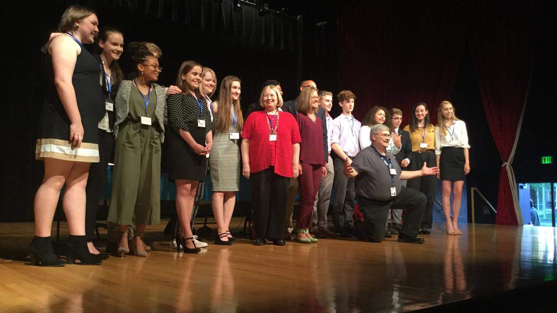 Student organizers of the Kentucky Town Hall on Gun Violence pose for a group picture with panel members.