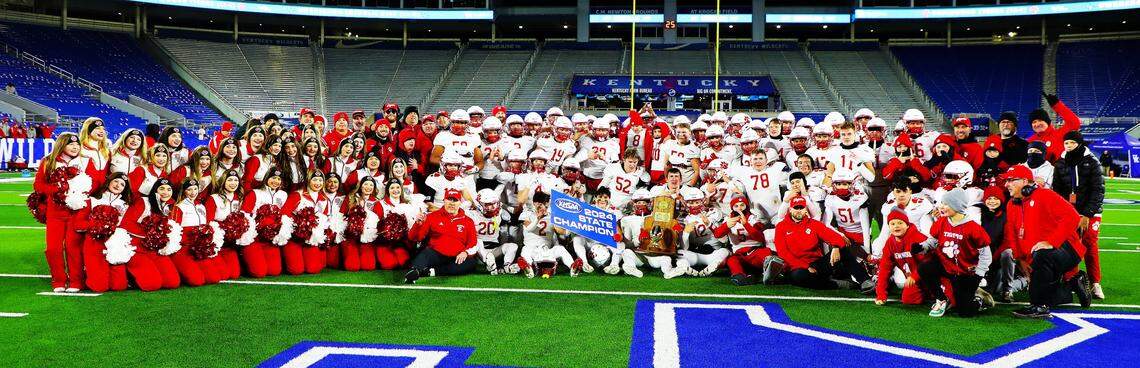 The Beechwood Tigers pose for championship photo after winning the school’s 18th football state title on Friday.