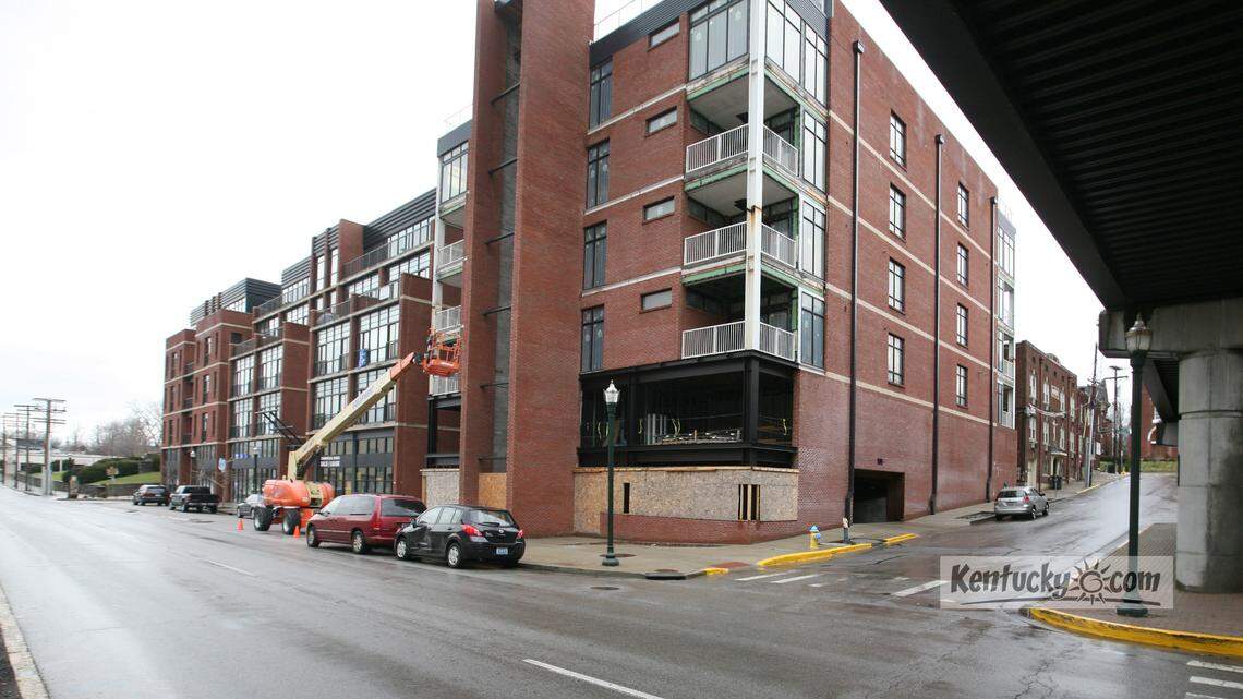Exterior taken on Tuesday, Jan. 17, 2012 of Phase 2 of 500's on Main in Lexington, Ky.  The Phase 2 building is closest to the camera (center of photo).  The MCNB Banks Inc., has taken ownership of Phase 2 of the 500's on Main condo/retail project. Bank wants to find a developer to either partner with, or to sell the project to, and have it finished. In the short term, the bank is finishing the exterior, putting in the windows, etc. so it looks presentable. Condos in Phase 1 are all sold. Photo by David Perry | Staff

