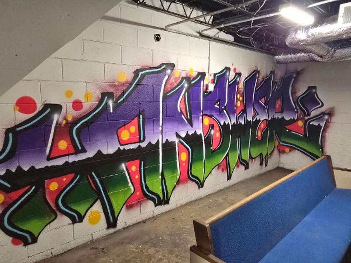 Frank Alguera and Sean Bolton asked friends to paint murals on the walls of the Donut Dungeon, an all-ages venue in the basement of Frank’s Donuts on Third Street in Lexington.