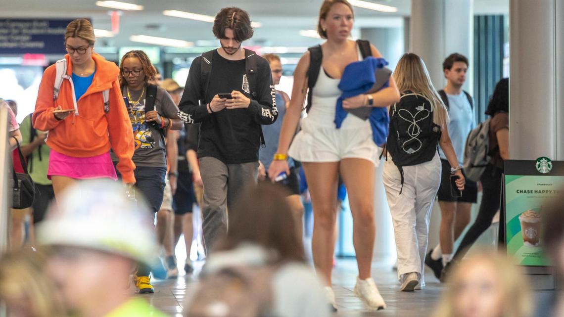 People walk through the Gatton Student Center on the University of Kentucky campus in Lexington, Ky., on Monday, Aug. 22, 2022.