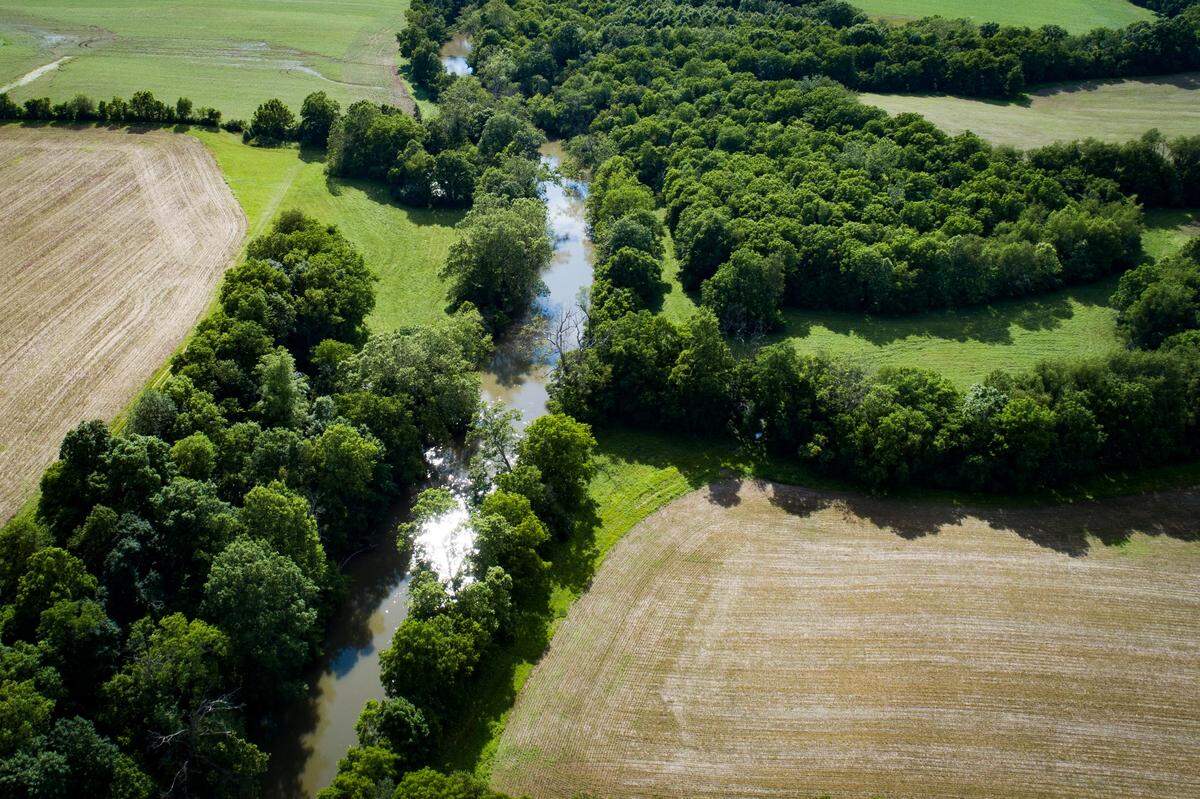 The Elkhorn Creek between Woodford and Scott would be part of a proposed RV park outside of Midway.
