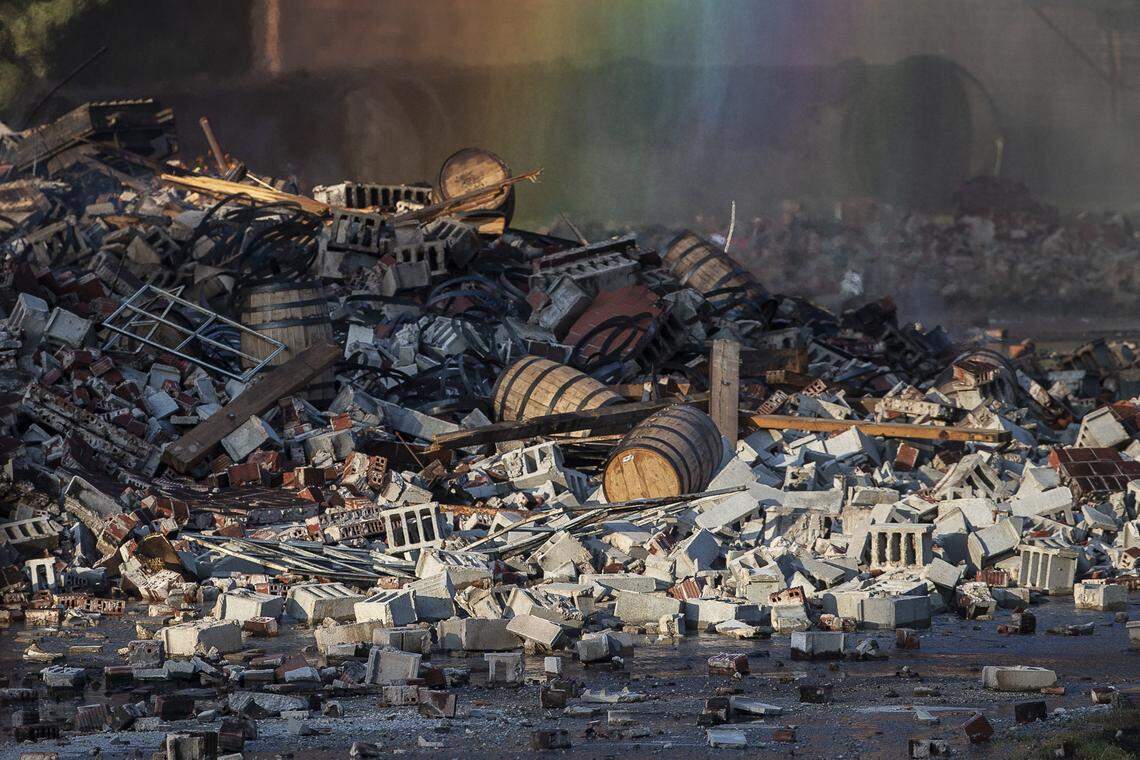 A Jim Beam bourbon warehouse in Woodford County, Ky., burns on Wednesday, July 3, 2019, after catching fire late the night before.