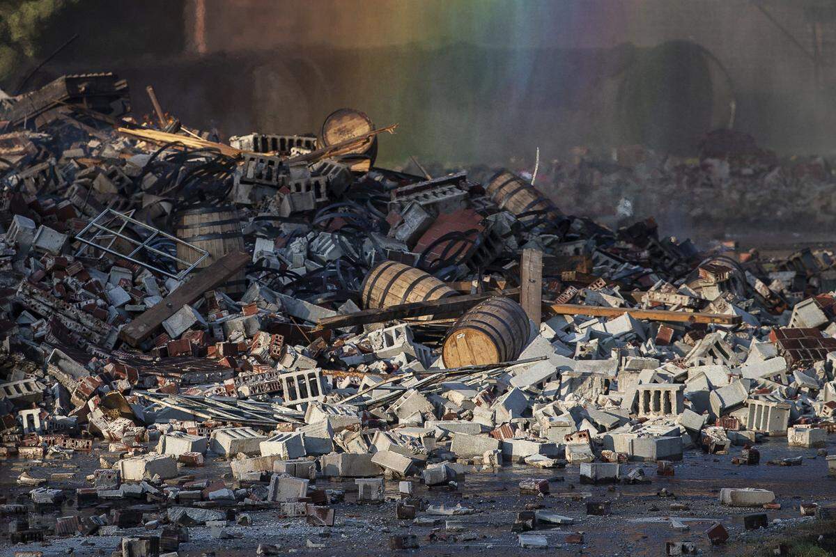 A Jim Beam bourbon warehouse in Woodford County, Ky., burns on Wednesday, July 3, 2019, after catching fire late Tuesday night.