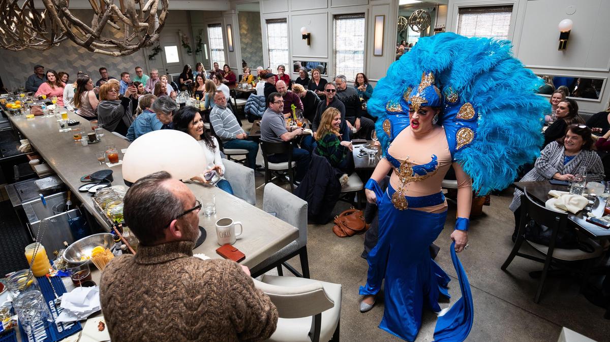 Drag queen Uma Jewels shows off her outfit to the crowd during the ‘Double D Brunch’ drag brunch event on Sunday, Jan. 19, at Epping’s on Eastside in Lexington, Kentucky.