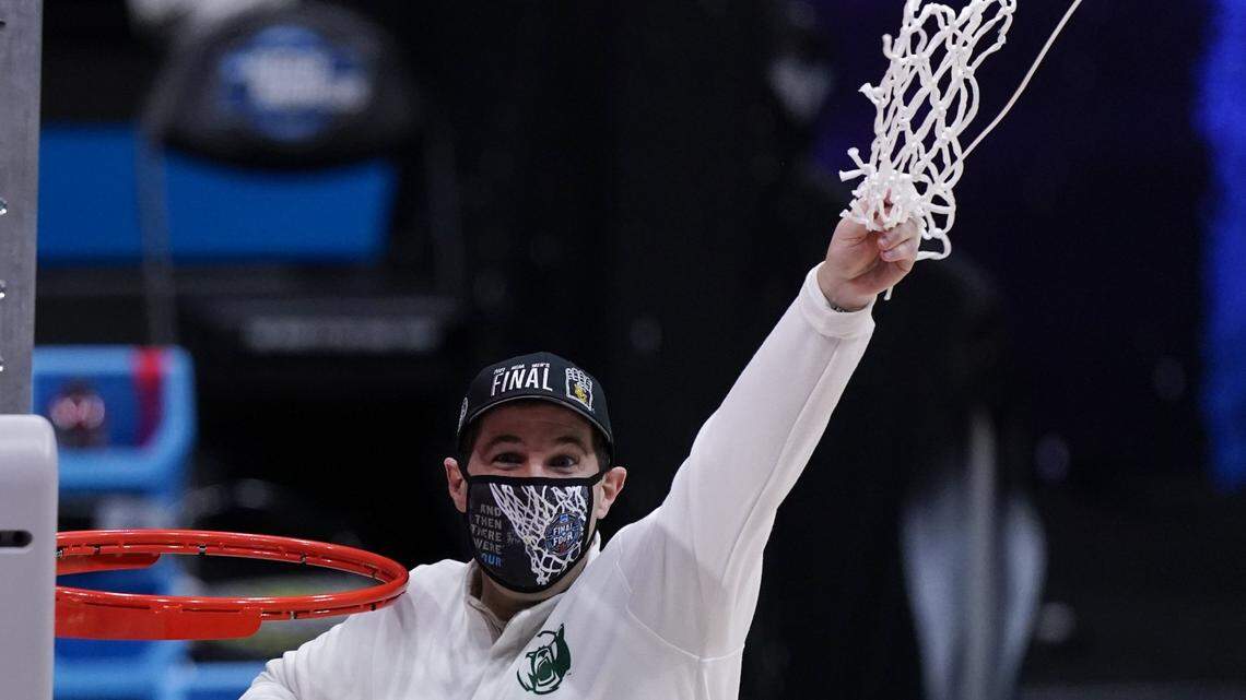 Baylor Coach Scott Drew and the Bears cut down the nets as the 2021 NCAA men’s basketball champions.