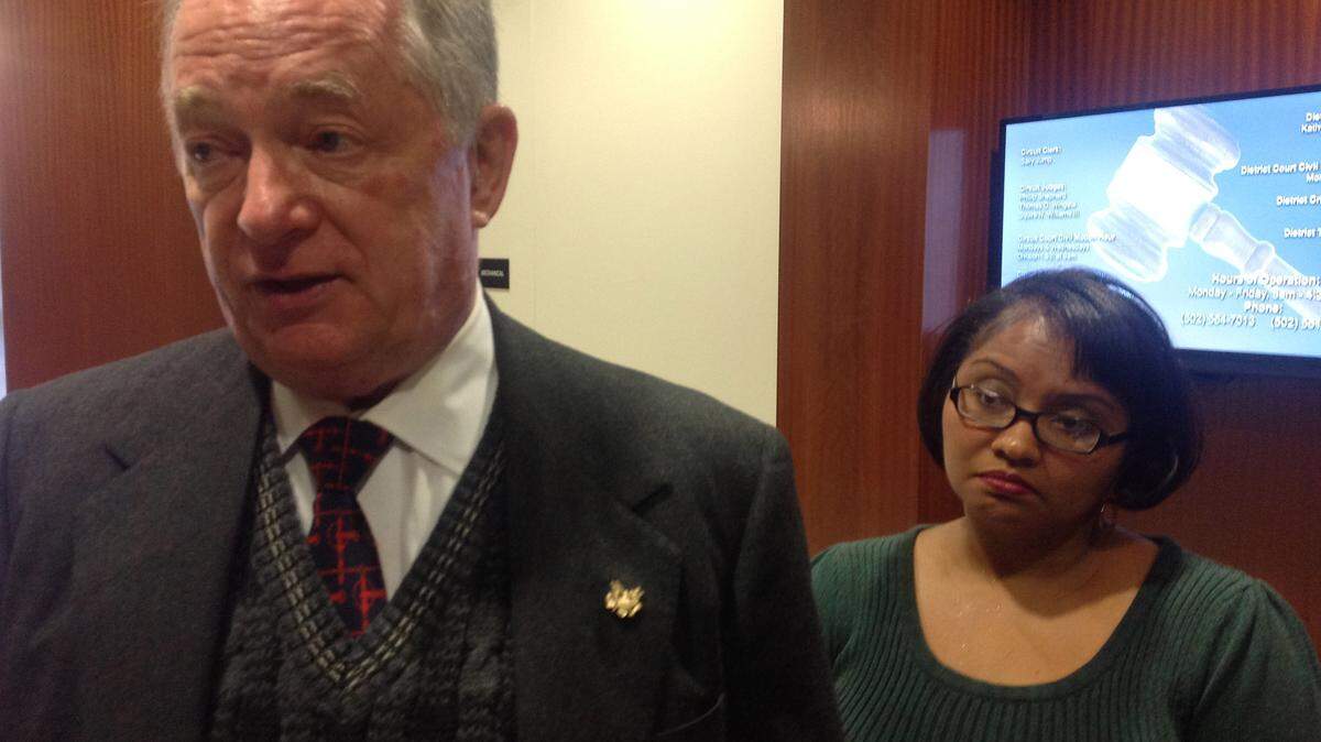 Louisville attorney Thomas Clay and his client Yolanda Costner