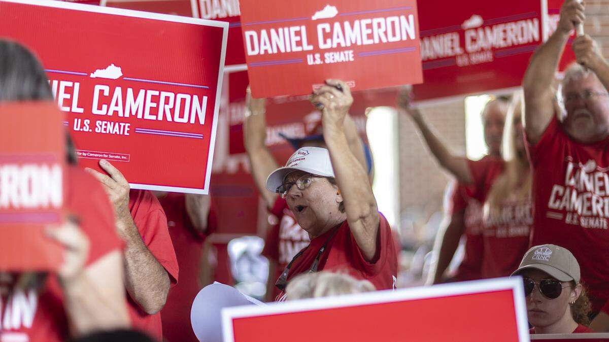 Daniel Cameron supporters cheer as the former Kentucky Attorney General and U.S. Senate candidate delivers a speech at the 145th annual St. Jerome Fancy Farm Picnic in Fancy Farm, Ky., on Saturday, Aug. 2, 2025.