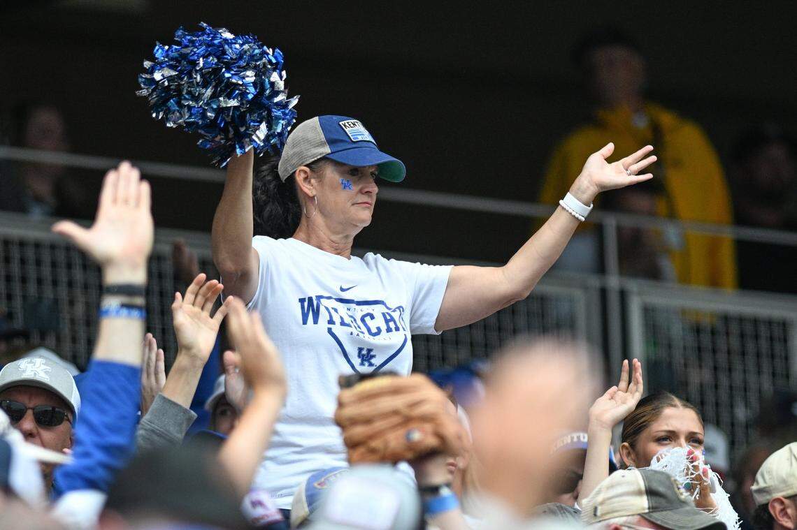 A Kentucky fan cheers on the Wildcats during their College World Series game against Florida in Omaha, Nebraska, on Wednesday.
